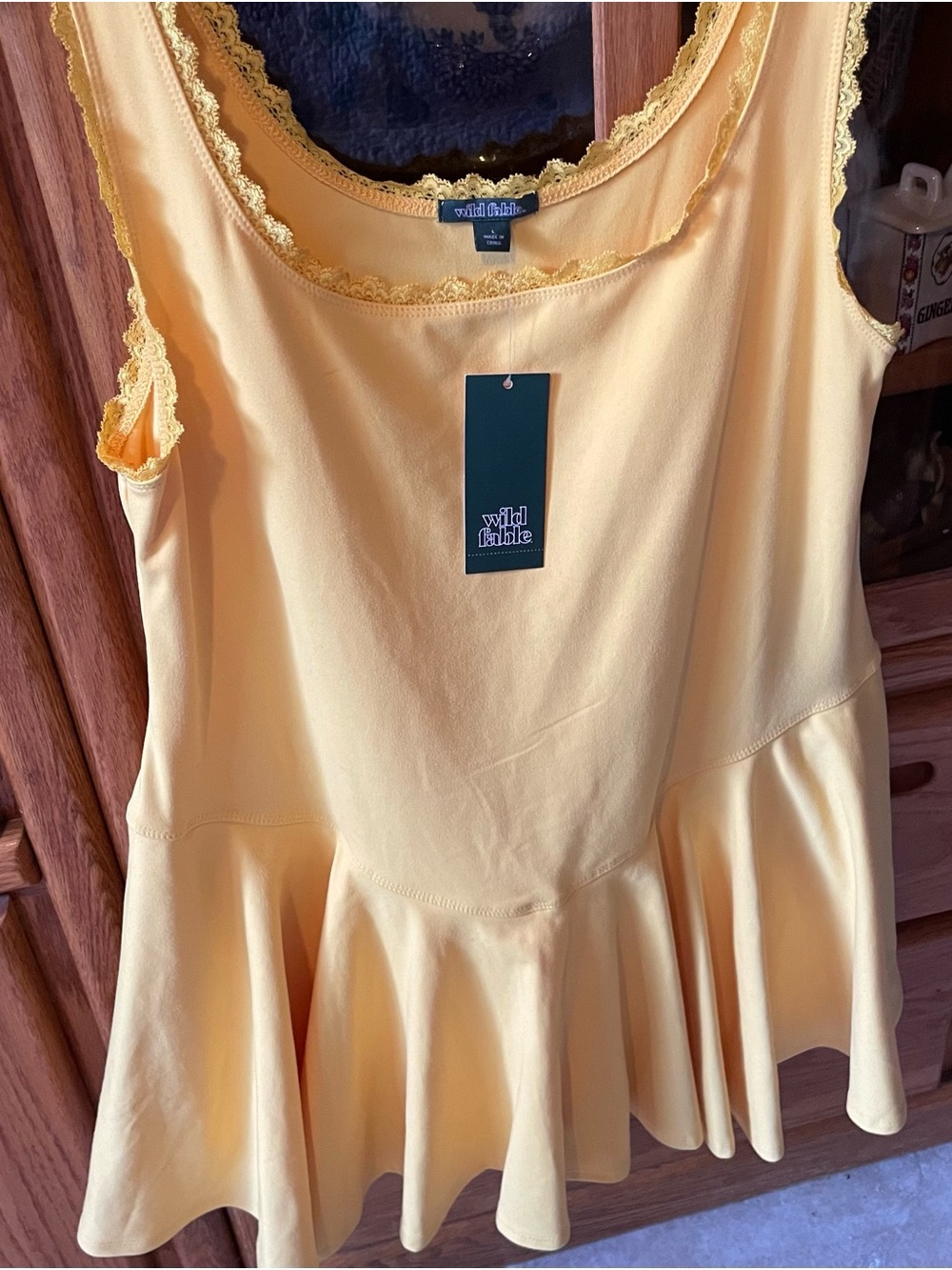 Woman’s Flattering Yellow Athletic Dress With Attached Shorts